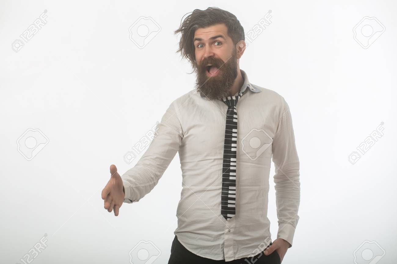guy hold hand for handshake fashion model with stylish hair stock
