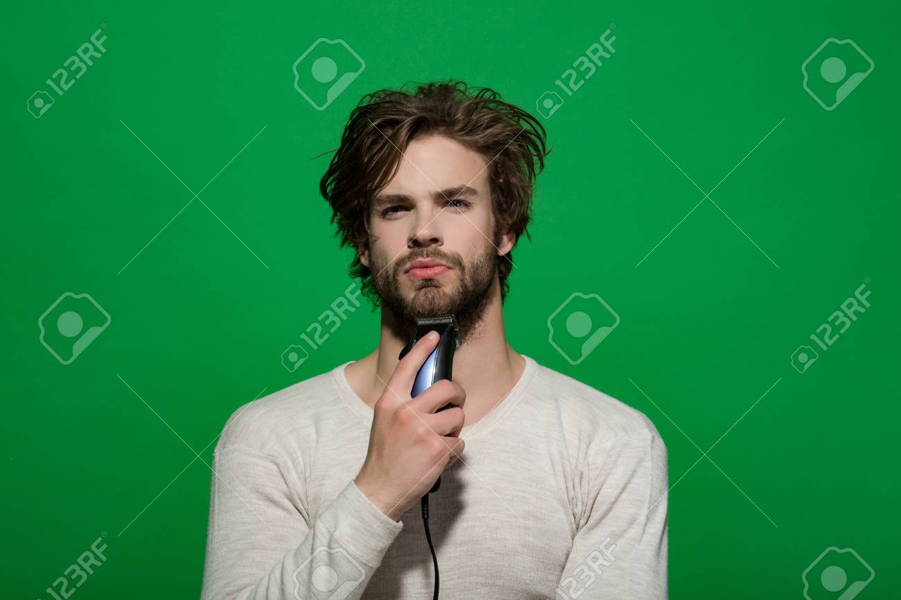 Male Beauty Man Shaving With Electric Razor Or Shaver Trimmer