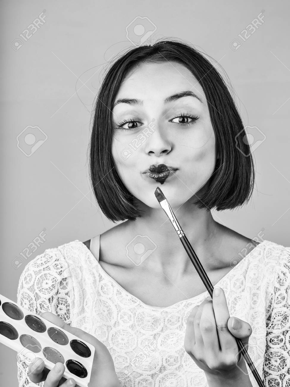 Girl With Short Hair In Tracery Blouse With Paint And Long