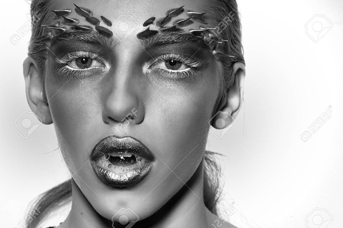 Closeup Portrait Of One Beautiful Wild Young Woman With Bright