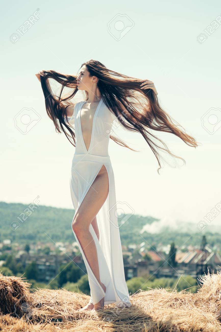 Fashion Summer Style Girl In Dress Pose On Natural Landscape Beauty Look Concept Woman With Flying Long Hair On Sunny Day Outdoor Vacation Travel Wanderlust Stock Photo Picture And Royalty Free Image