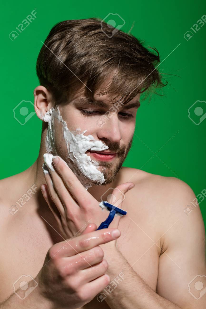 shaving facial hair with razor