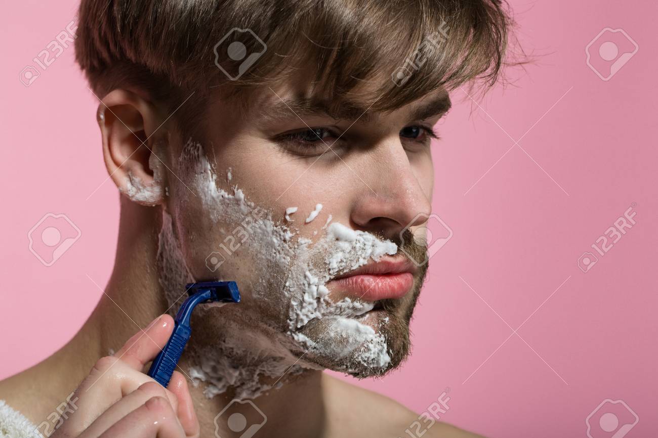 shaving facial hair with razor