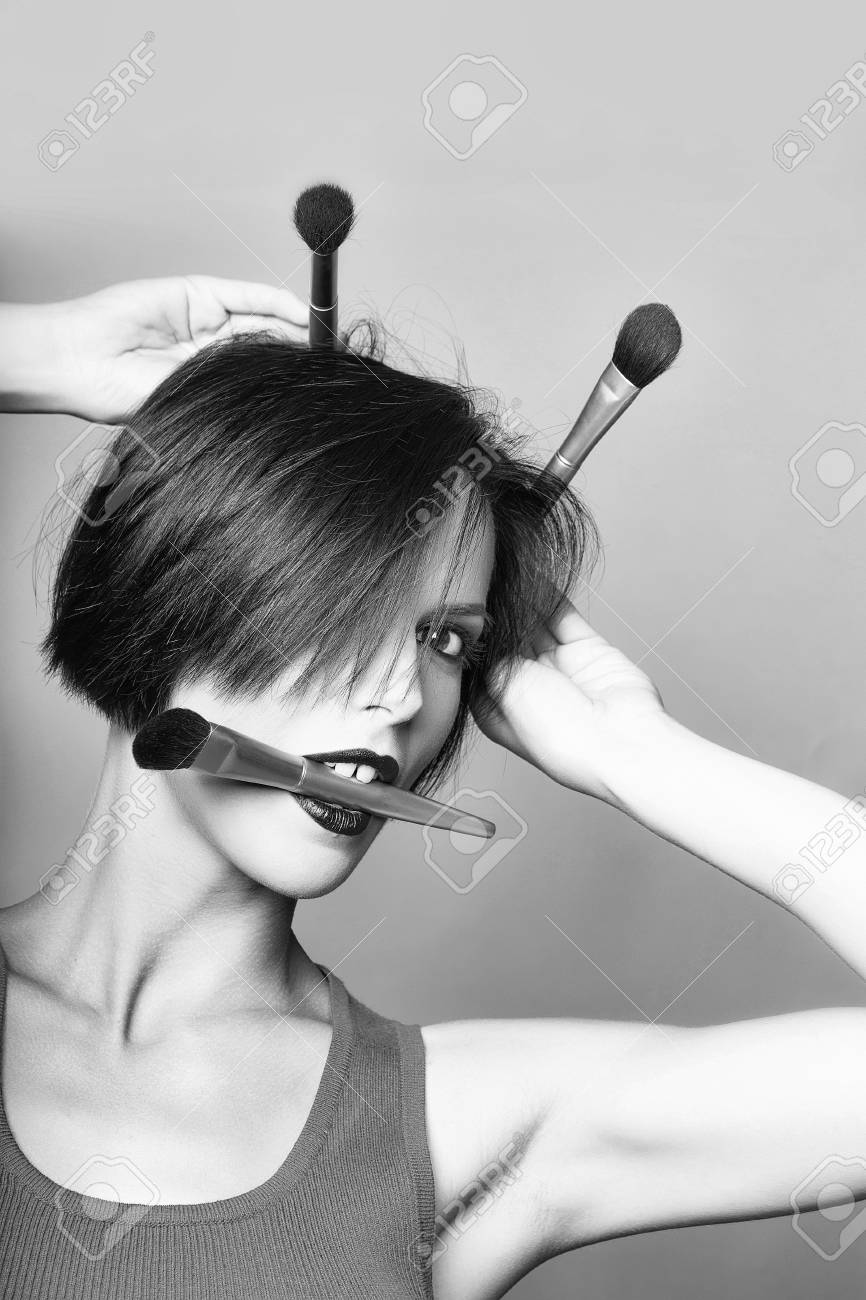 Pretty Girl With Dark Short Hair Red Lips And Sexy Make Up In