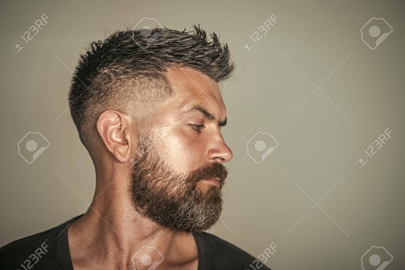 barber shop. hair style. man with bearded face profile and stylish..