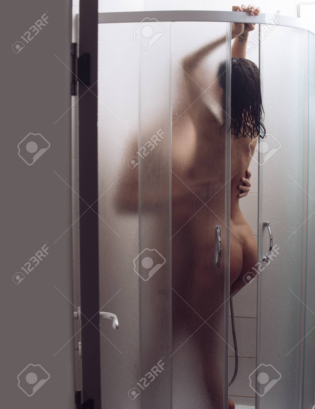 nude shower sex Couple In Love Have Sex In Shower Cabin. Girl Naked With Macho Hugs, Makes Love. Love And Sex Concept. Couple Full Of Desire Kissing In Shower. Wet Brunette With Nude Buttocks And