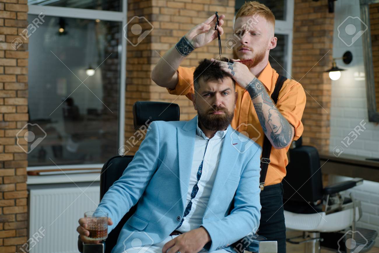 Bearded Man Getting Haircut By Hairdresser At Barbershop Vintage