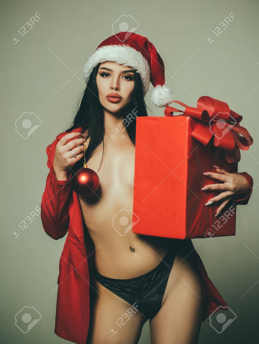 Red Christmas Gift Box With Boobs. Sexy Boobs And New Year Party. Naked  Woman. Lingerie Concept. Topless Santa Woman. Erotic Lingerie For New Year.  Sensual Pretty Girl With Hot Tits. Stock Photo,