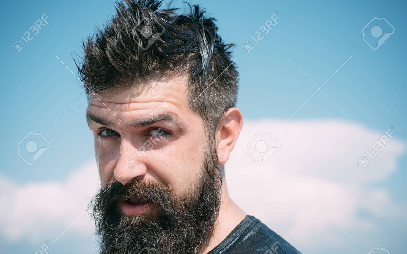 Trendy Hairstyle For Bearded Man Long Bearded And Unshaven Man