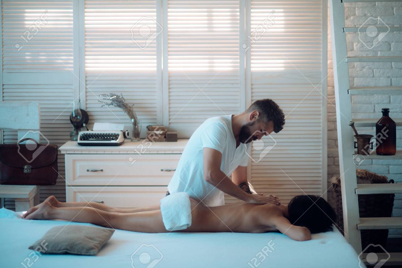 a couple engaged in sex games and erotic massage