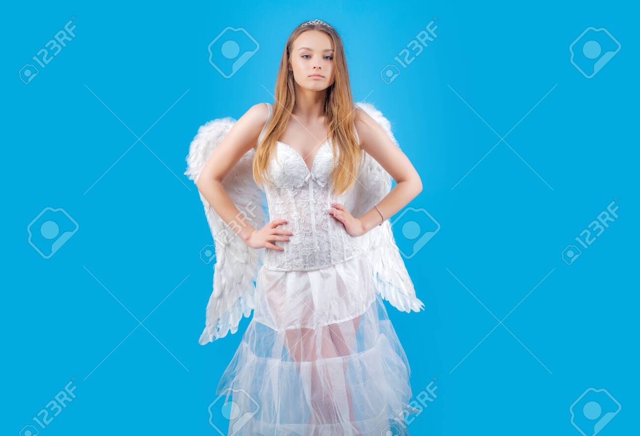 Lovely and cute youth. Pretty girl as the cupid with a wings congratulating on St Valentines day. Angelic face. Lovely girl. The God of Love. St Valentines day. - 132077259 Lovely and cute youth. Pretty girl as the cupid with a wings congratulating on St Valentines day. Angelic face. Lovely girl. The God of Love. St Valentines day. - 132077259