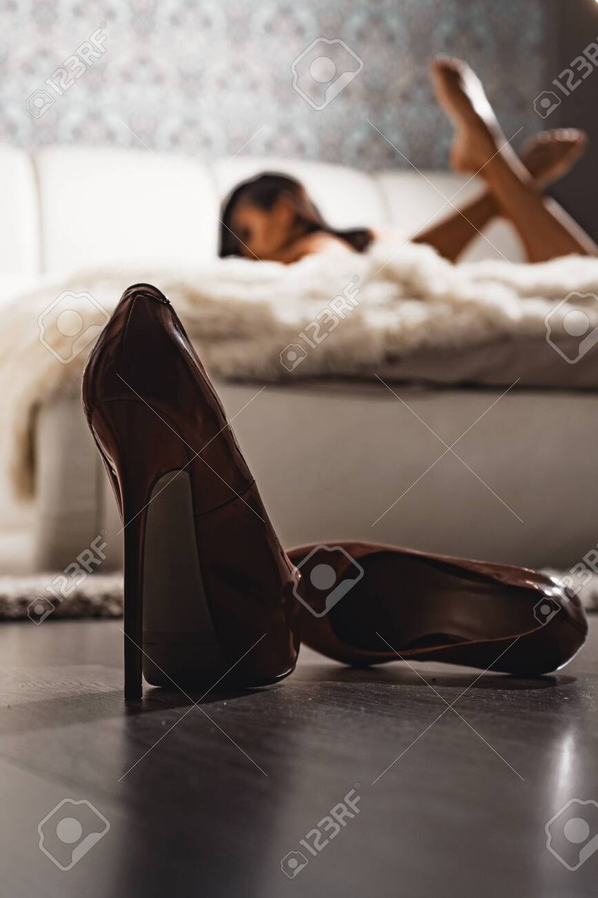 High Heels In Front Of Female Bedroom pic