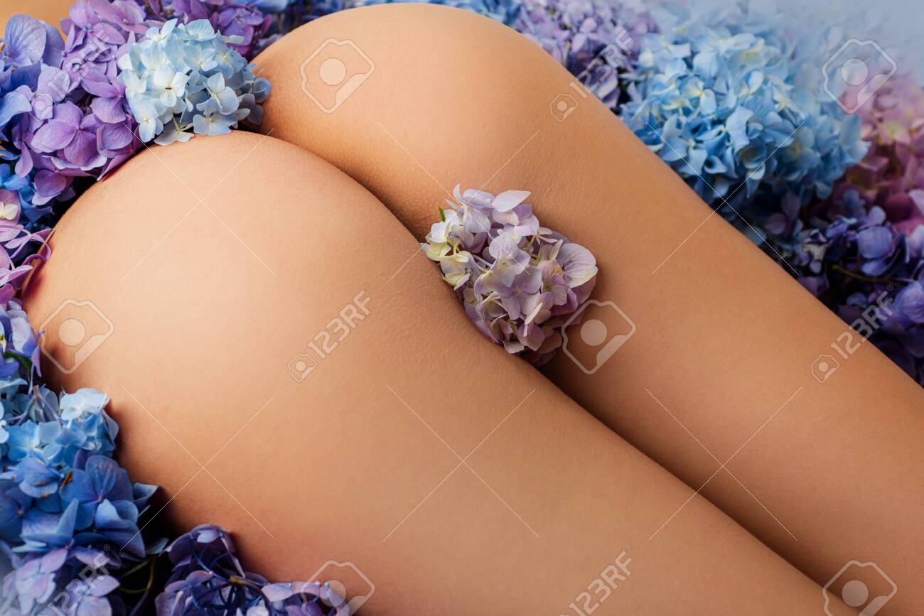 Naked Girl. Closeup Fashionable Naked Girl In Flovers. Womens Butt.  Romantic Gorgeous Ass Pose. Stock Photo, Picture and Royalty Free Image.  Image 152235385.