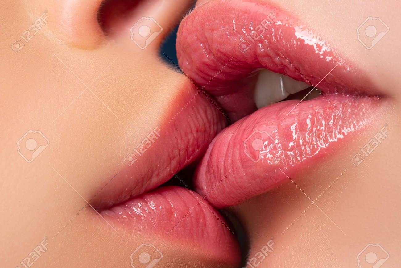 Sensual wet kiss close-up of lips locked in passionate intimacy