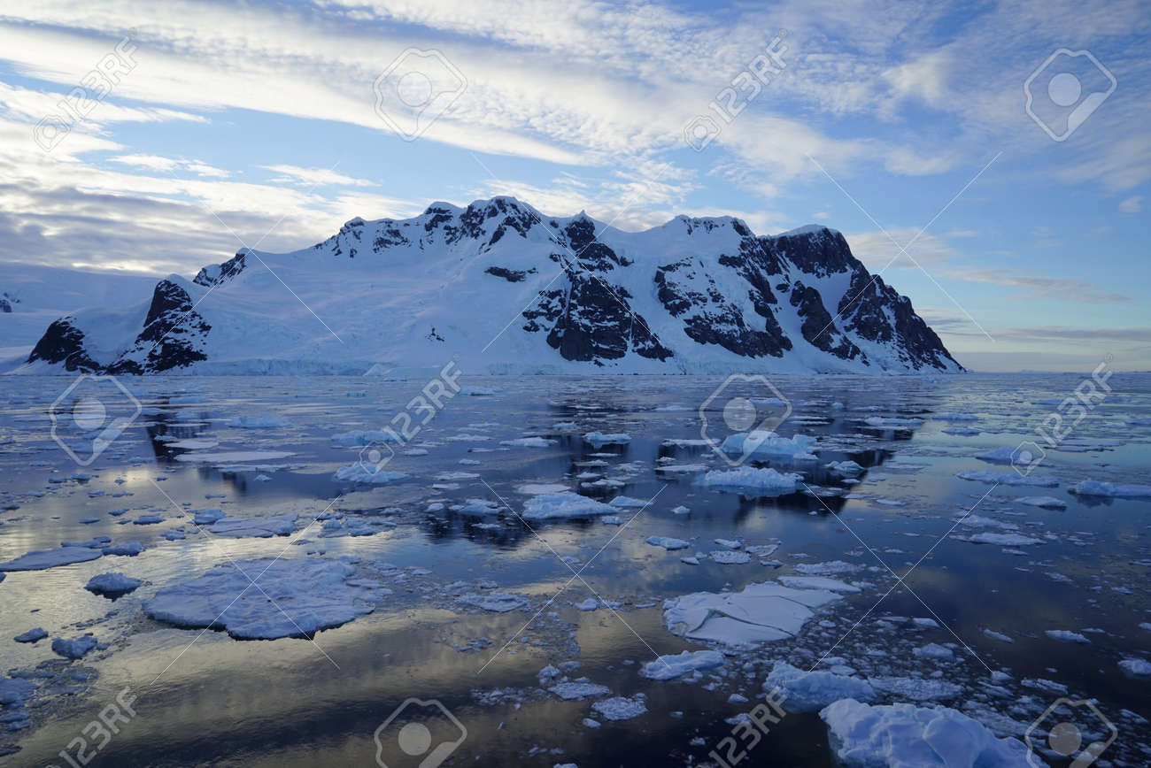 This is summer in Pleneau Island, Antarctic Peninsula. There are penguins, whales, icebergs, ice floes, glaciers, oceans, radioactive clouds and sunlight. - 159771433 This is summer in Pleneau Island, Antarctic Peninsula. There are penguins, whales, icebergs, ice floes, glaciers, oceans, radioactive clouds and sunlight. - 159771433