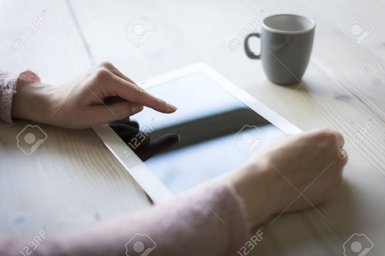 using pad or tablet pc close up - 25710116 using pad or tablet pc close up - 25710116
