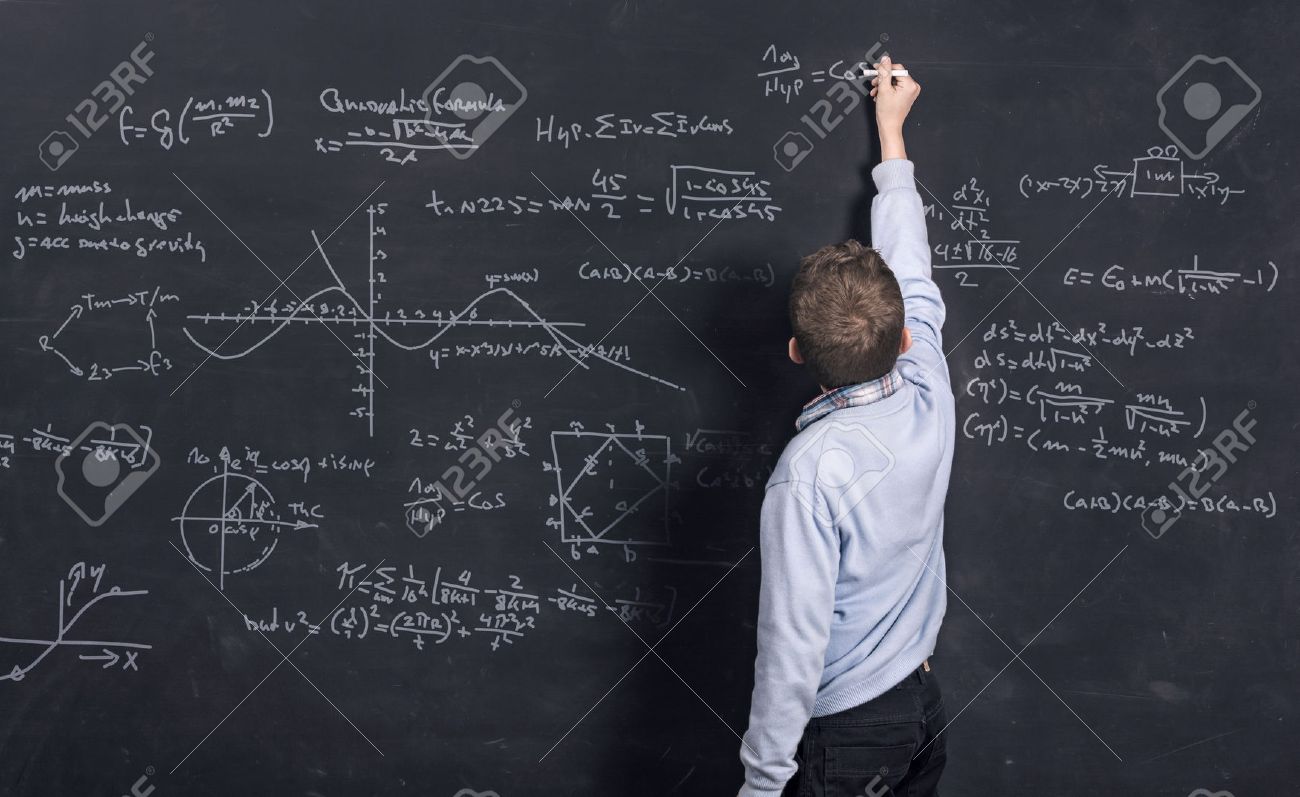 Smart child doing mathematic on chalkboard - 26559181 Smart child doing mathematic on chalkboard - 26559181