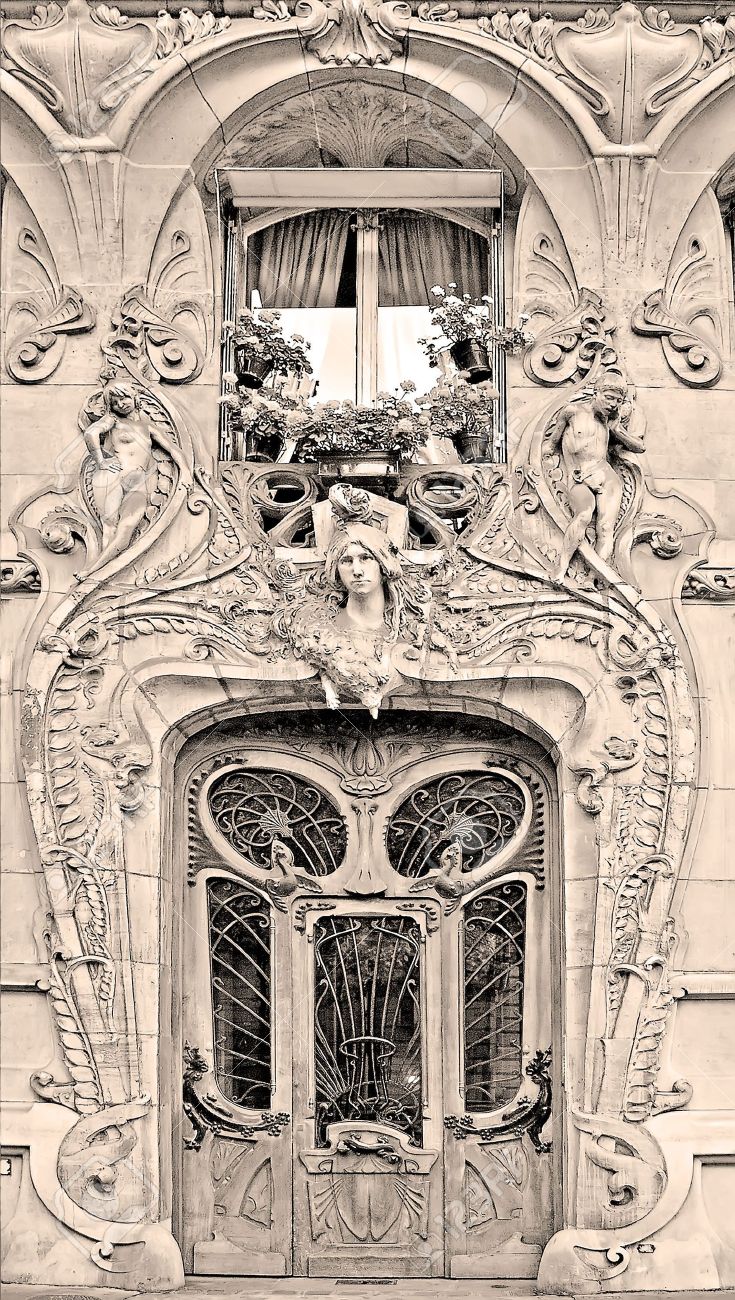 typical art nouveau building in paris france sepia stock photo