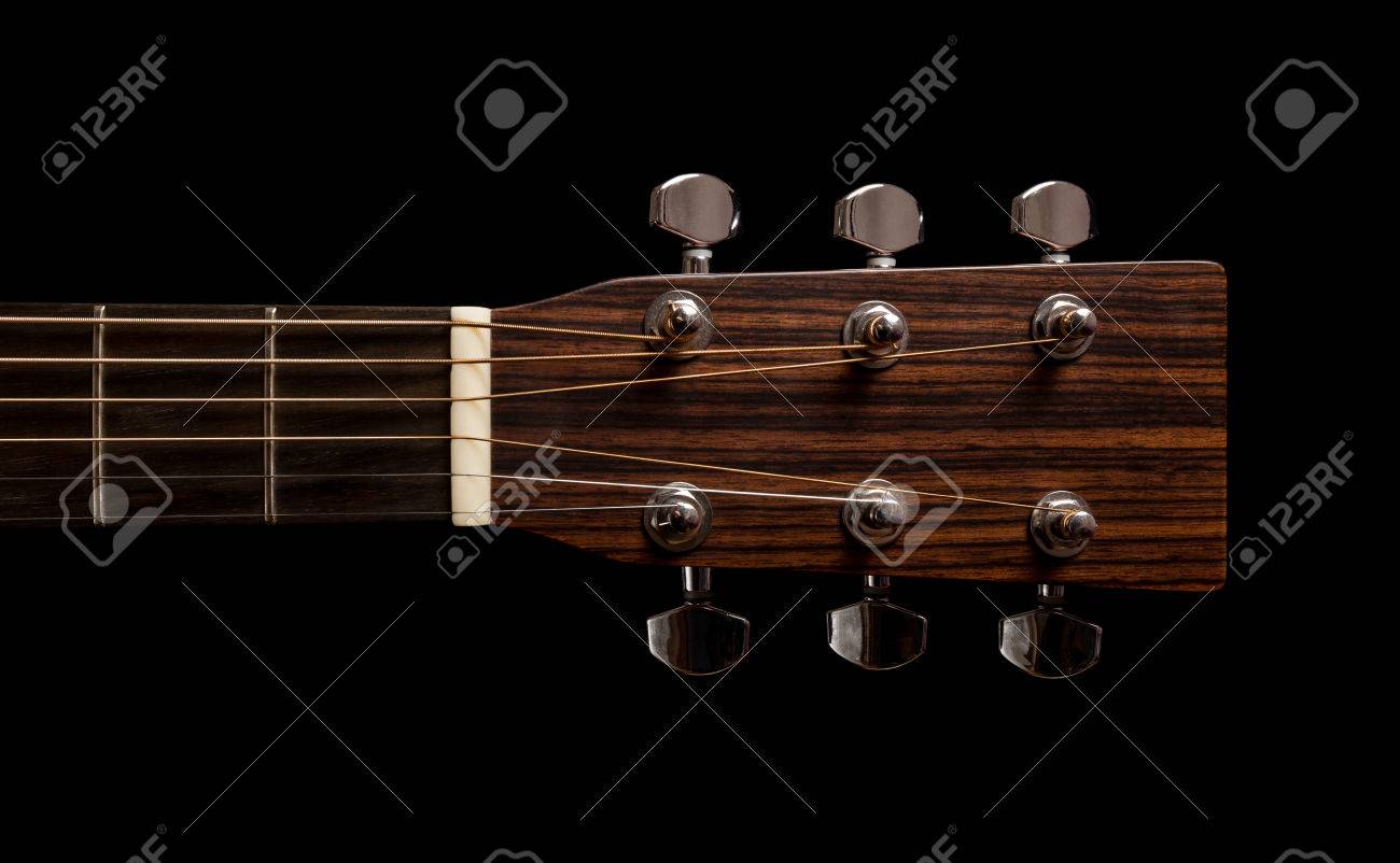 stylish classical guitar dark wood on black background top