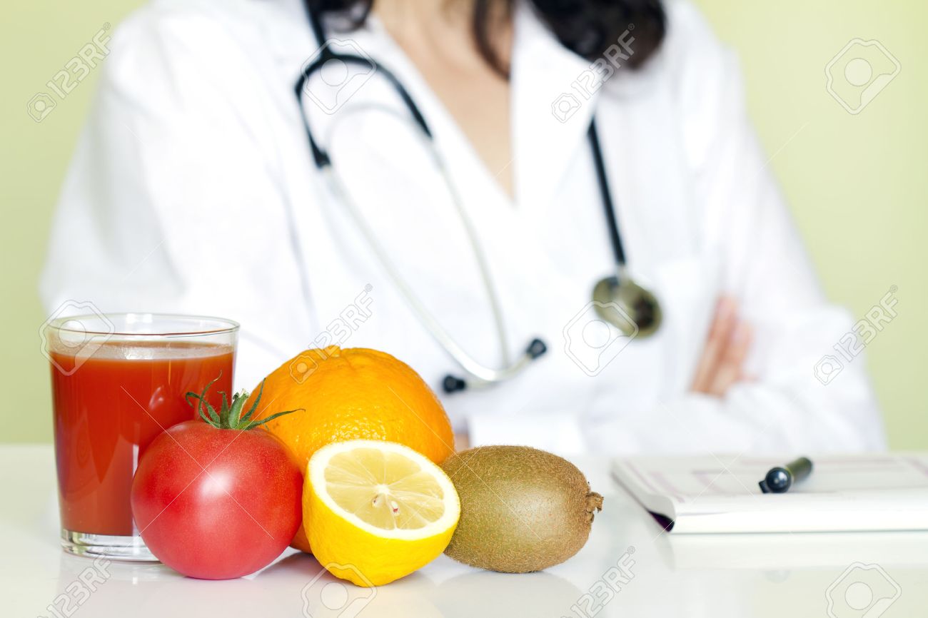 doctor nutritionist in office with healthy fruits diet concept nutritionist office