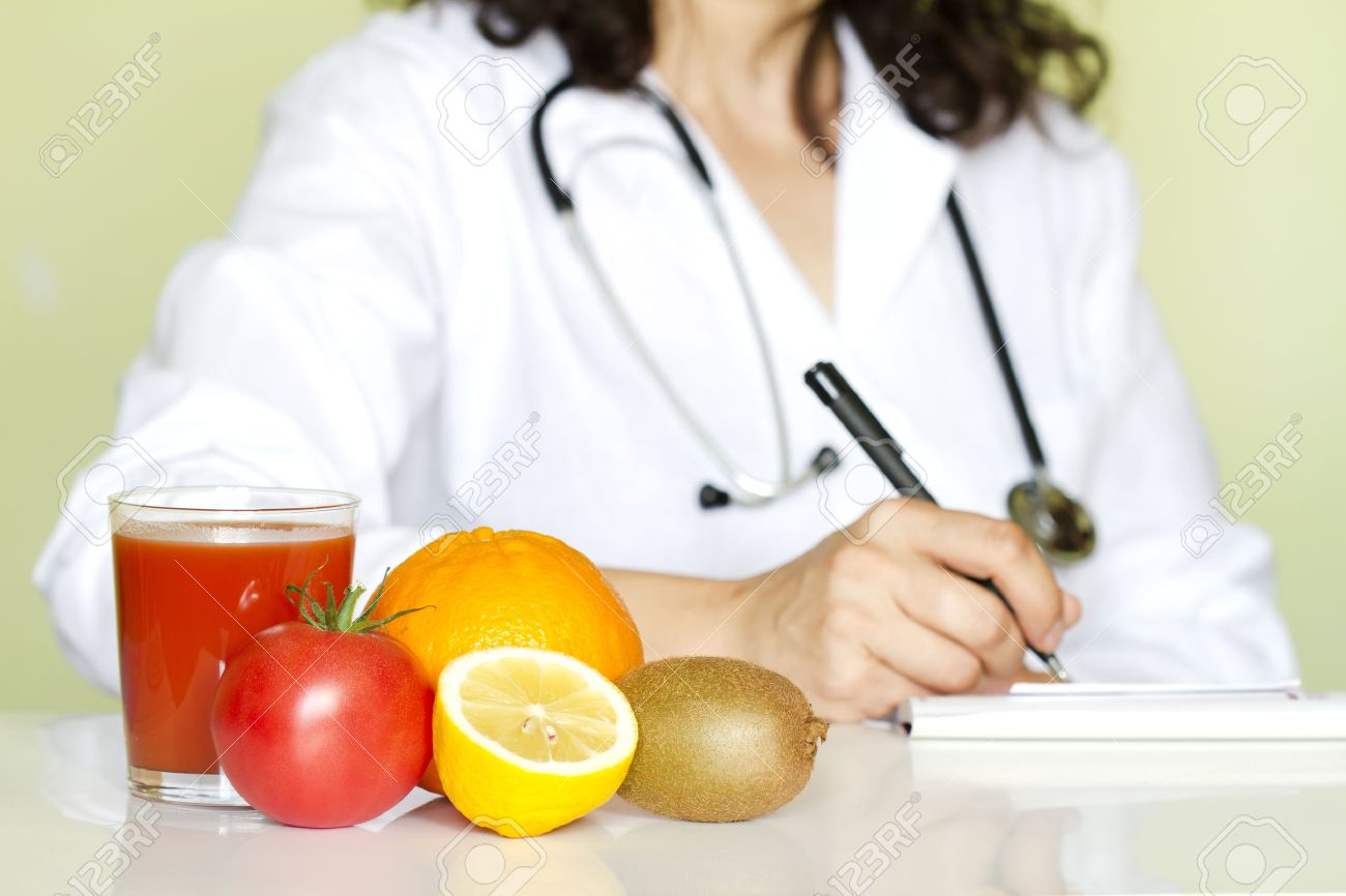 doctor nutritionist in office with healthy fruits diet concept nutritionist office