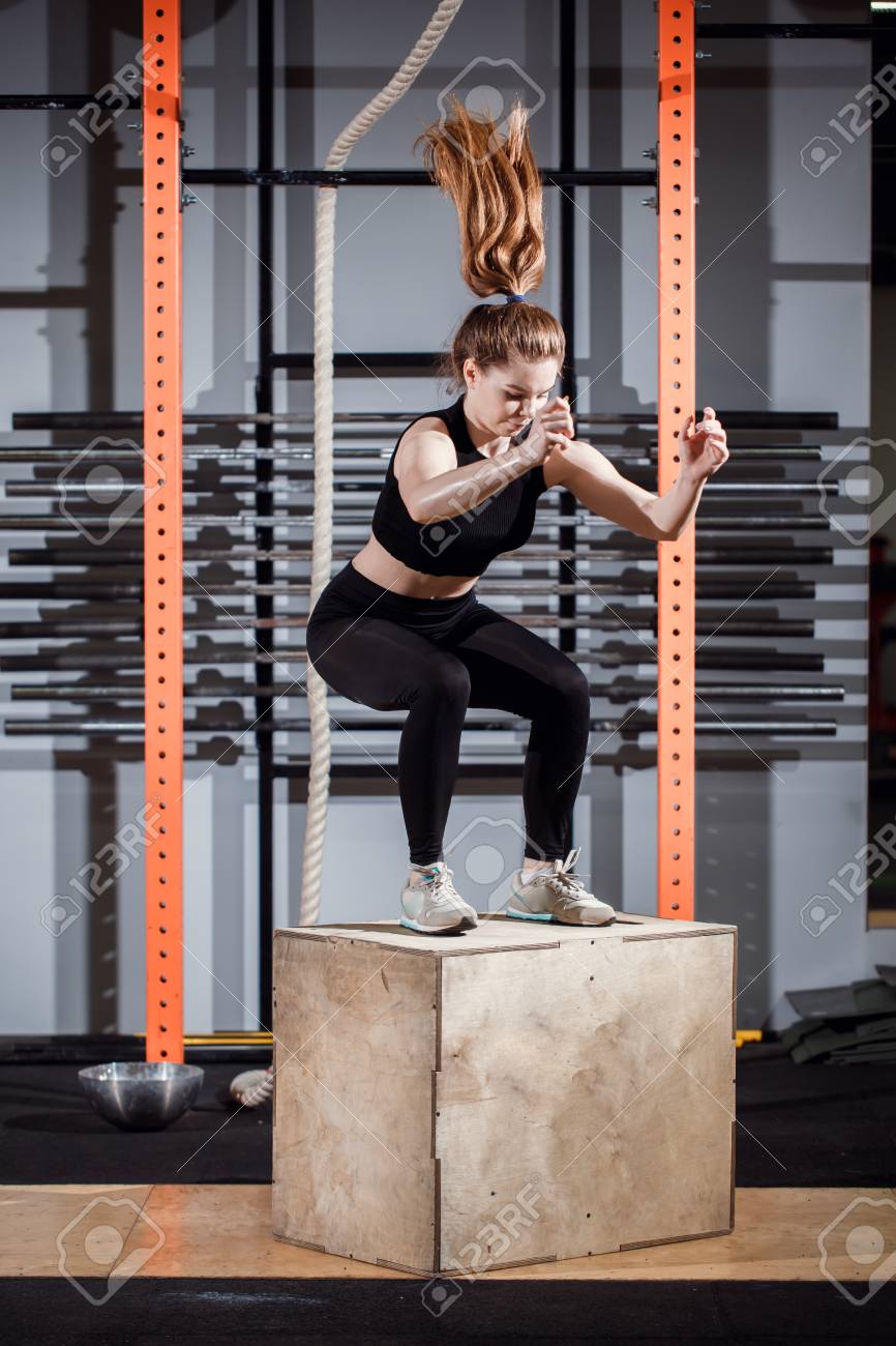 Fitness Woman Jumping On Box Training At The Gym Cross Fit Exercise Stock Photo Picture And Royalty Free Image Image 95855580
