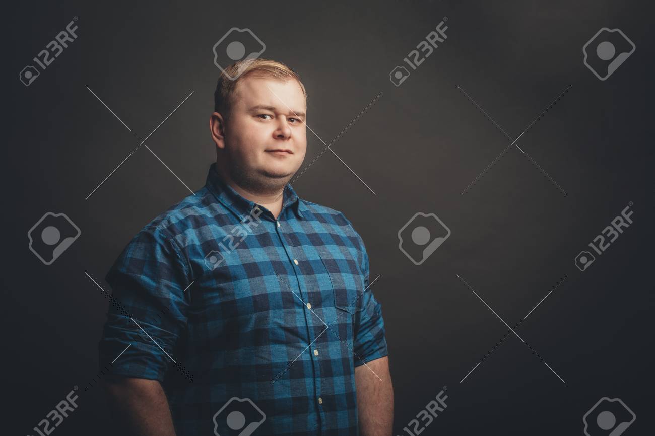 caucasian fat man looking at camera - 100363672 caucasian fat man looking at camera - 100363672