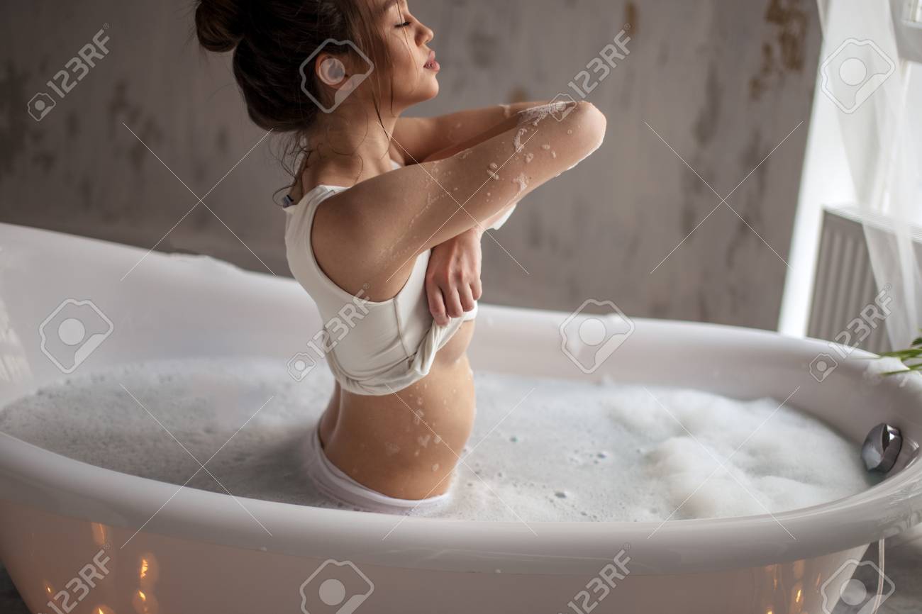 Erotic Dance In The Bathtub Stock Photo, Picture and Royalty Free Image.  Image 105529365.