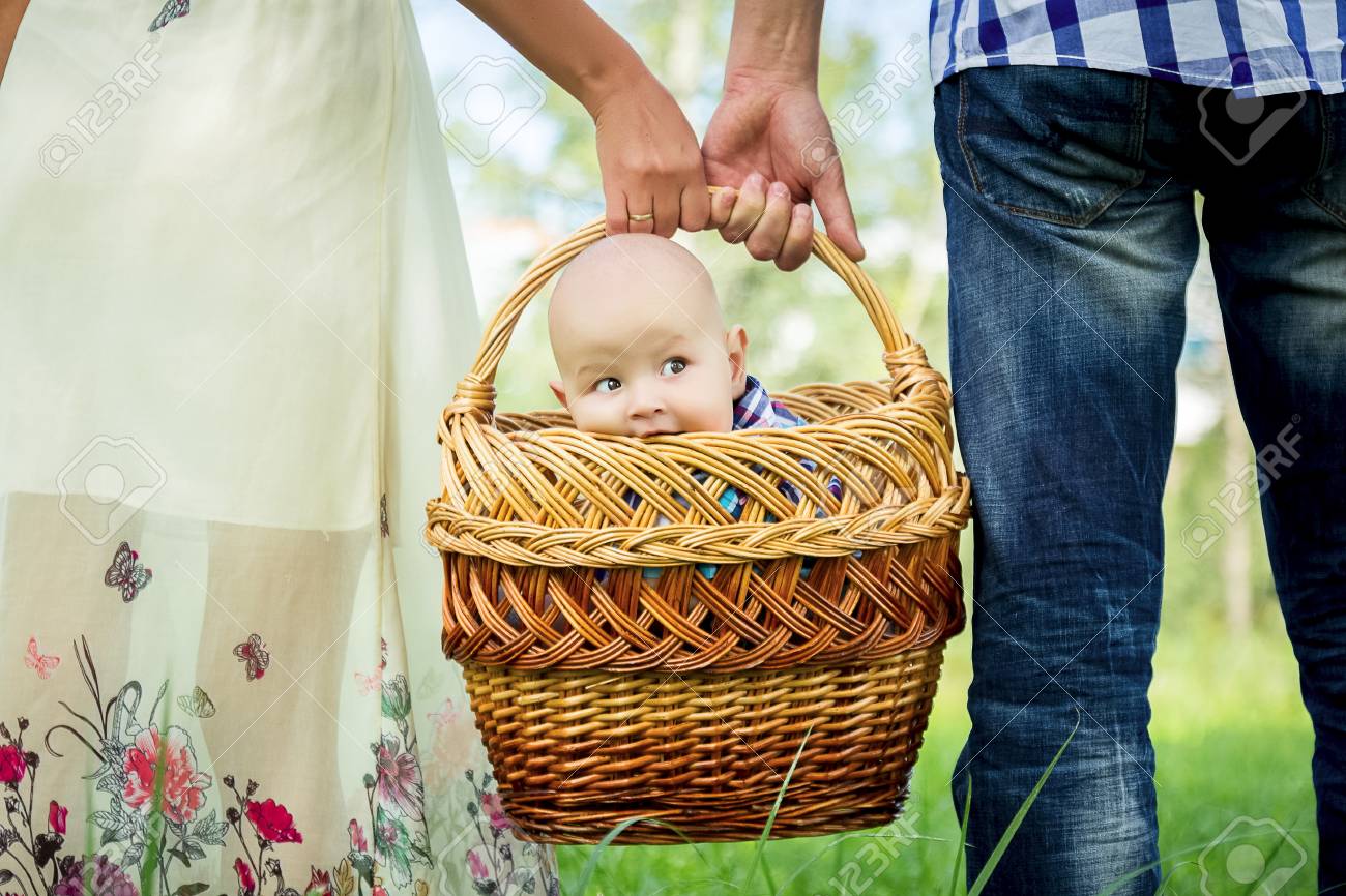 baby holding basket