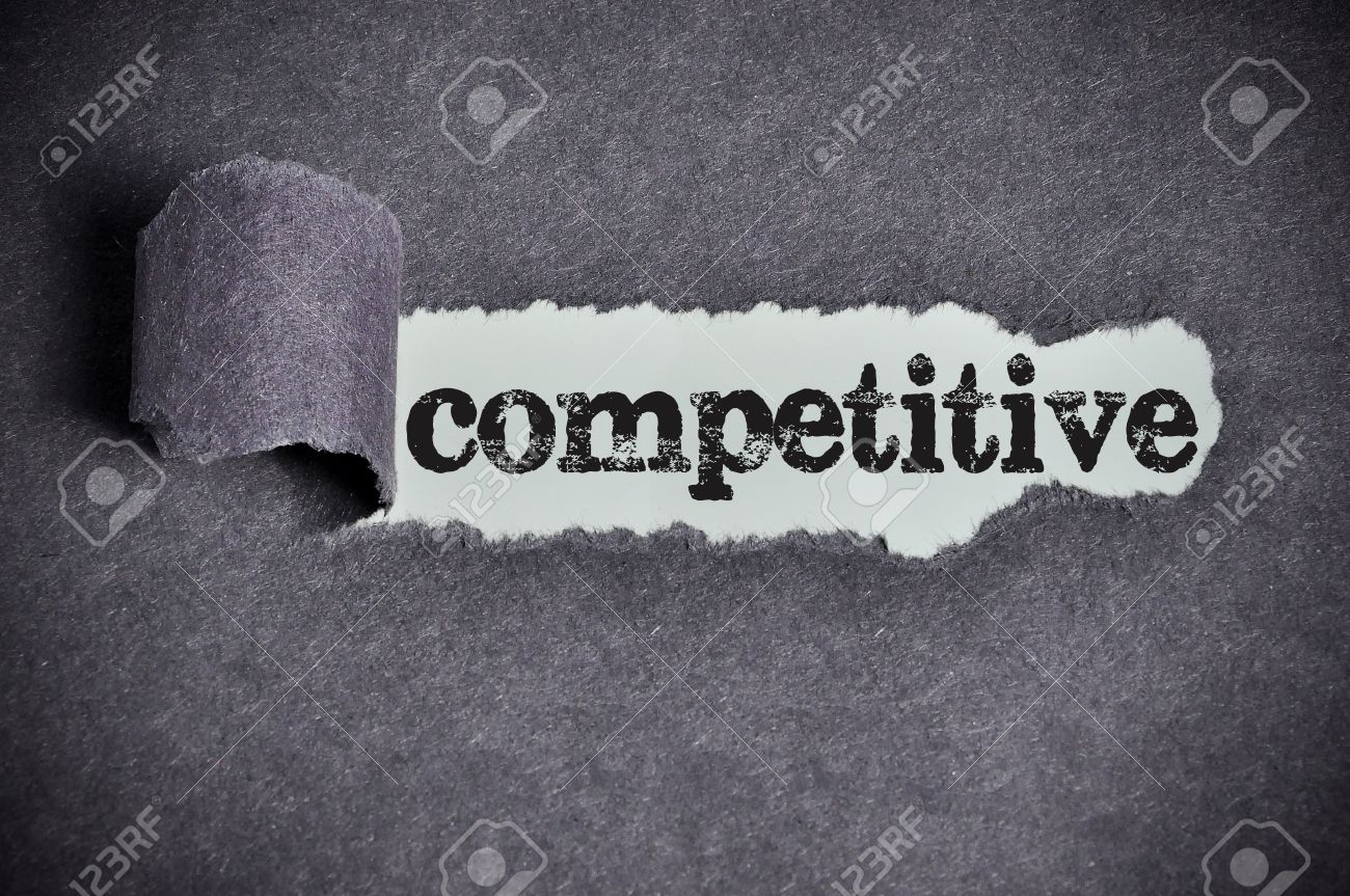 competitive word under torn black sugar paper stock photo picture competitive word