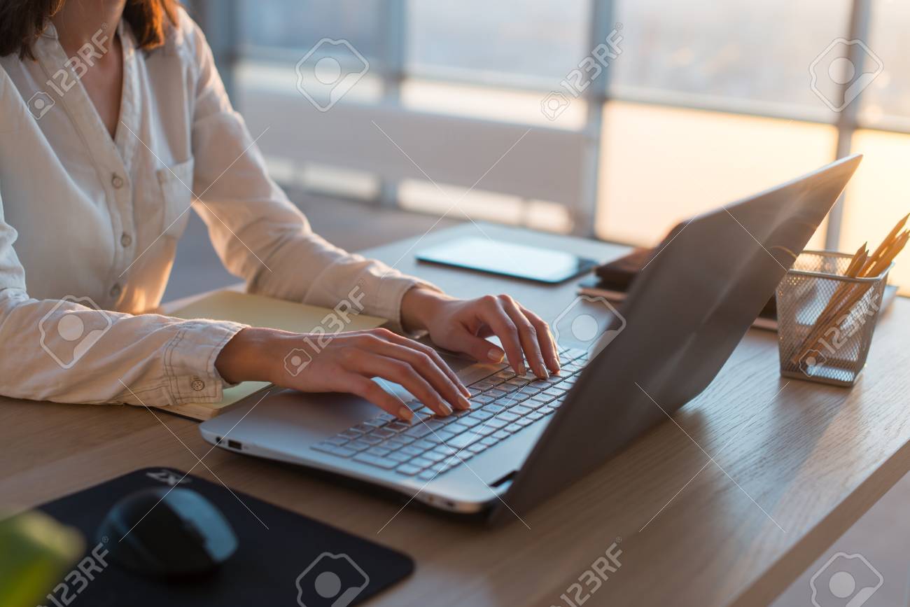 female teleworker texting using