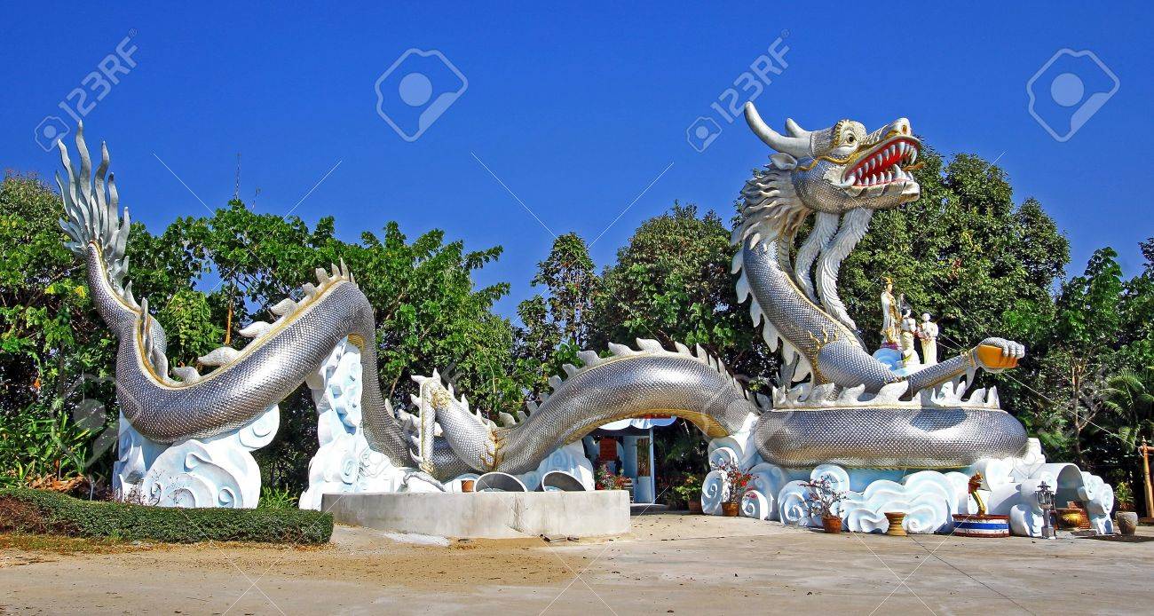 silver dragon statue come with lucky and gold stock photo picture