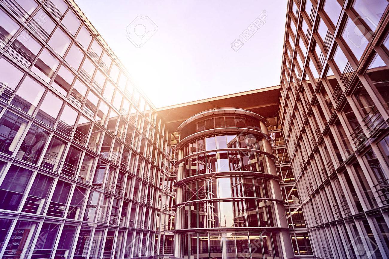 modern glass and steel office building in the sun, Berlin, Germany - 36438956 modern glass and steel office building in the sun, Berlin, Germany - 36438956