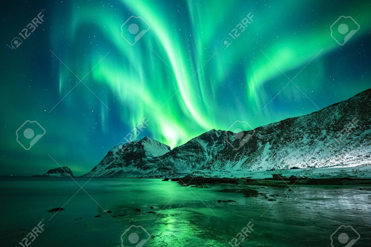 beautiful northern lights over winter sea and mountain scene, lofoten, norway - 132456043 beautiful northern lights over winter sea and mountain scene, lofoten, norway - 132456043