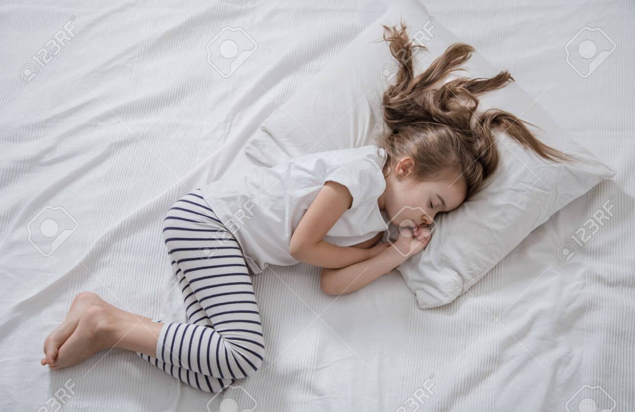 white bed for little girl