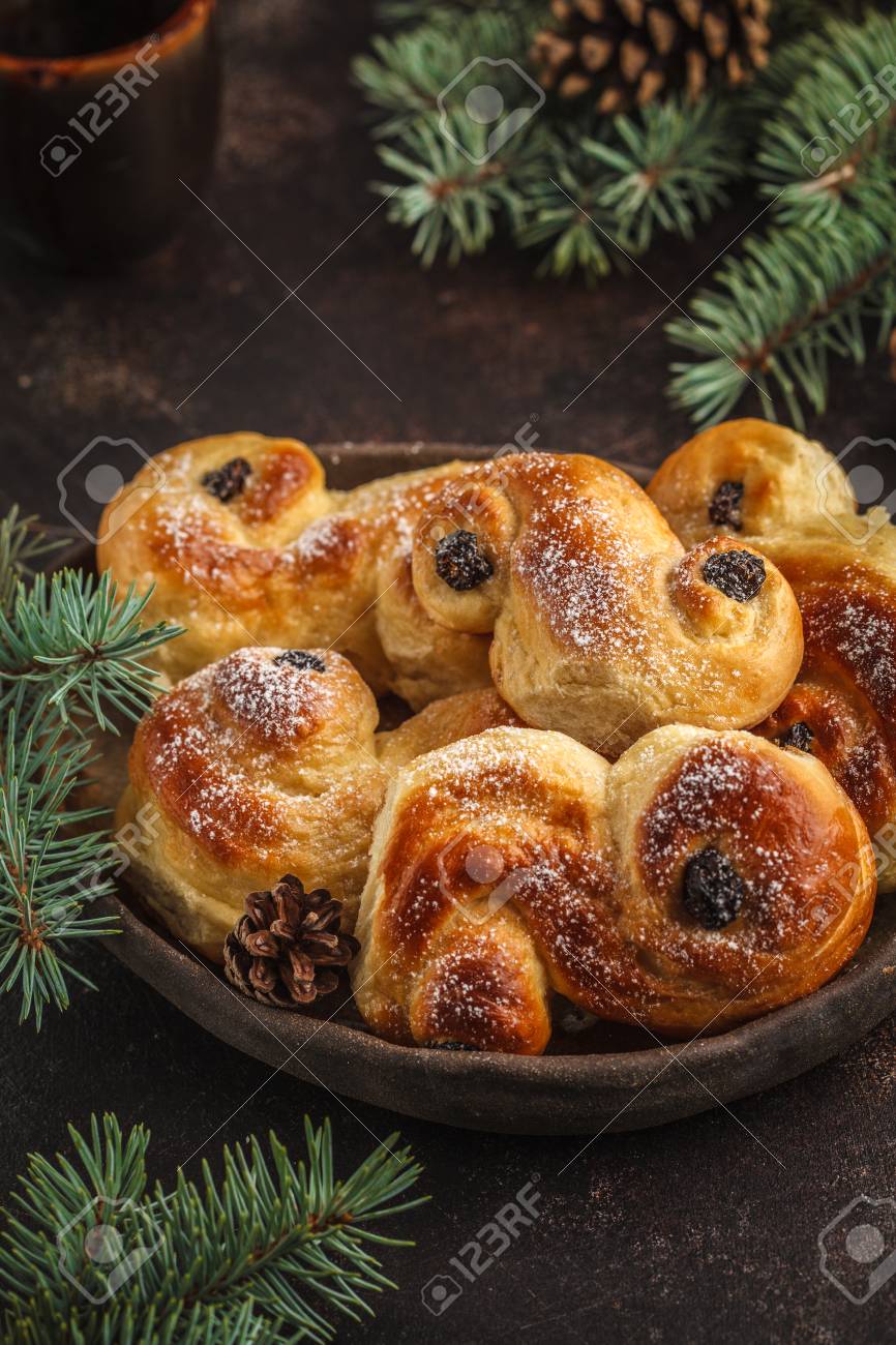 stock photo traditional swedish christmas saffron buns lussebulle or lussekatt swedish christmas dark background christmas decoration - Traditional Swedish Christmas Decorations stock photo traditional swedish christmas saffron buns lussebulle or lussekatt swedish christmas dark background christmas decoration - Traditional Swedish Christmas Decorations