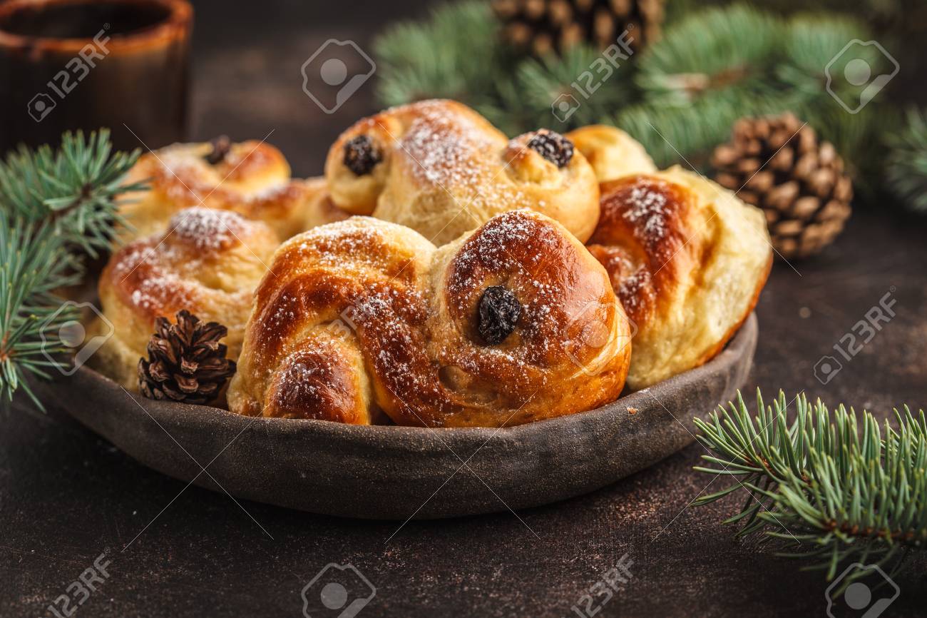 stock photo traditional swedish christmas saffron buns lussebulle or lussekatt swedish christmas dark background christmas decoration - Traditional Swedish Christmas Decorations stock photo traditional swedish christmas saffron buns lussebulle or lussekatt swedish christmas dark background christmas decoration - Traditional Swedish Christmas Decorations