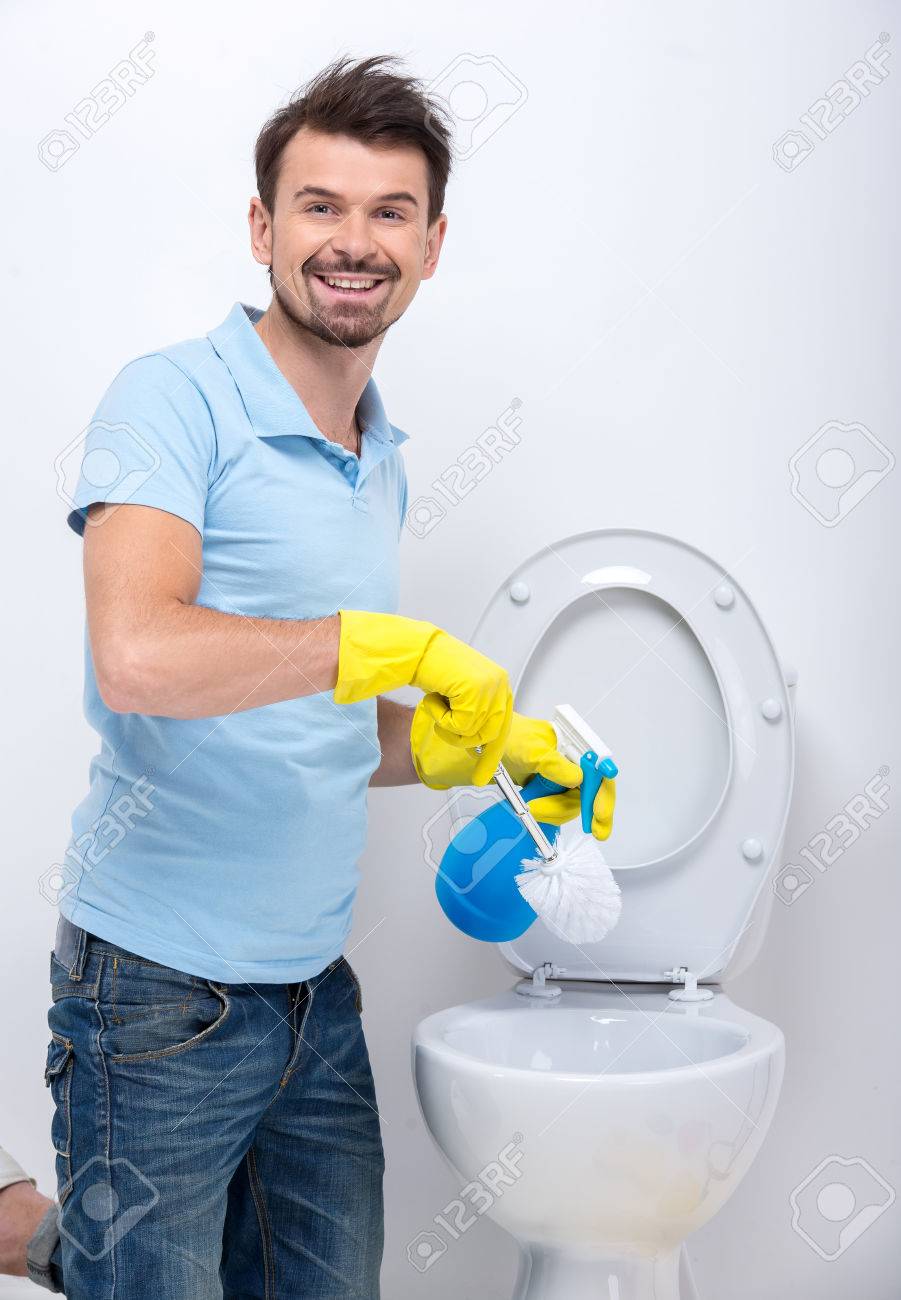 smiling man is cleaning