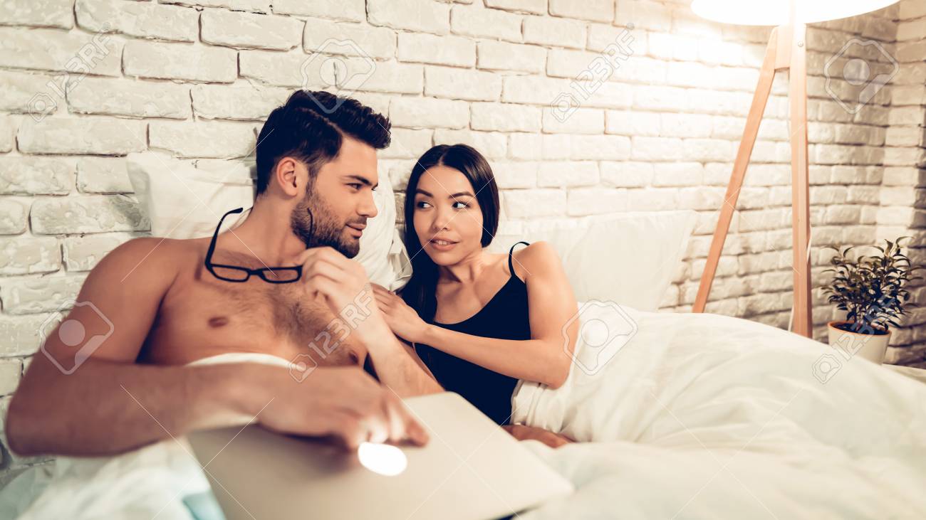 Cute Couple In Love Lying Bed Ready To photo