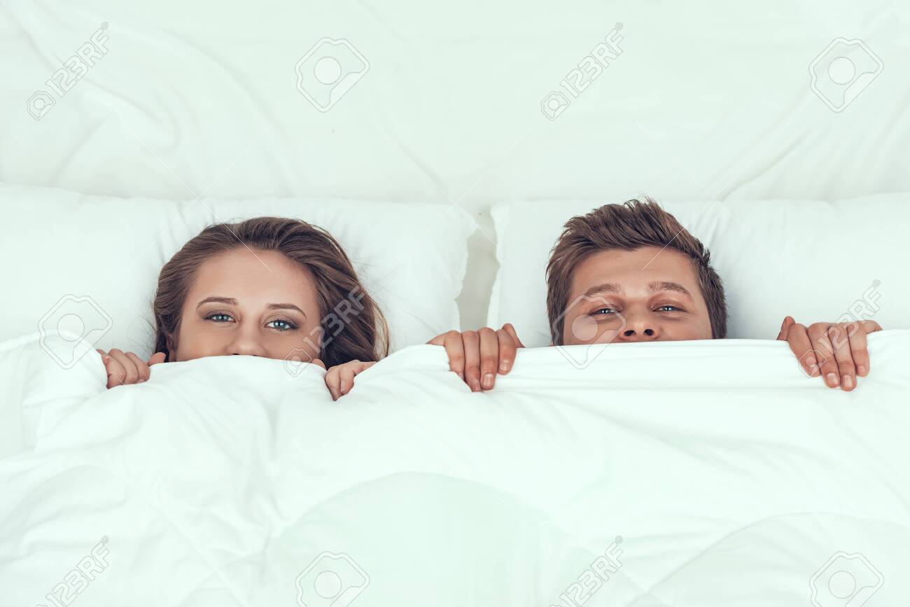 Married Couple Lying Together People image