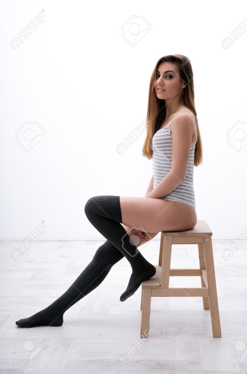 Side View Portrait Of A Sexy Woman Sitting On The Chair Stock Photo,  Picture and Royalty Free Image. Image 37061209.