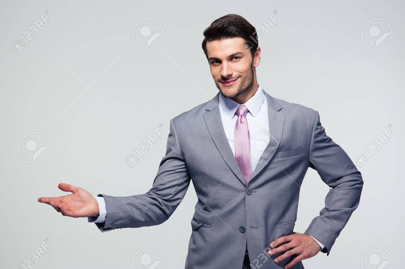 businessman with arm out