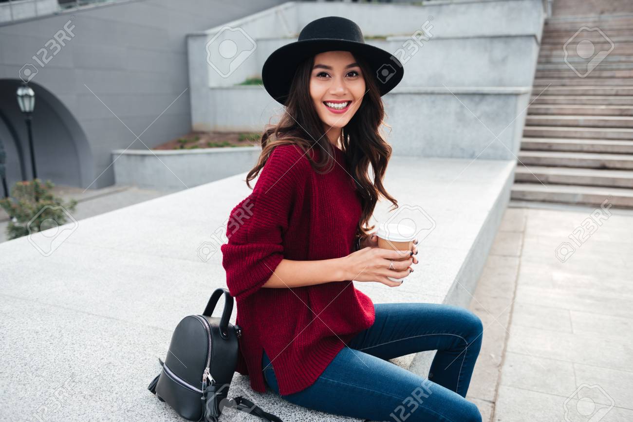 A girl wearing a hat Clearance