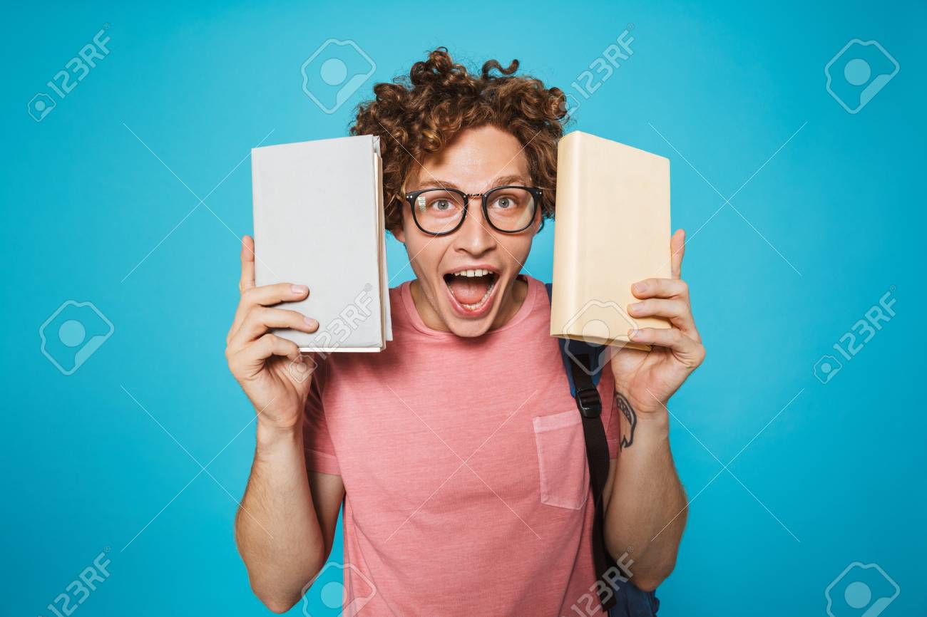 Image Of Genius Student Guy With Curly Hair Wearing Glasses And