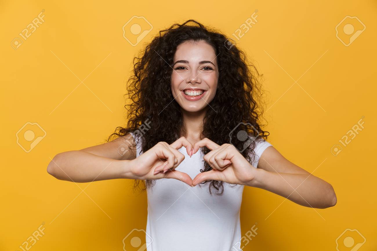 Image Of European Woman 20s With Curly Hair Smiling And Showing