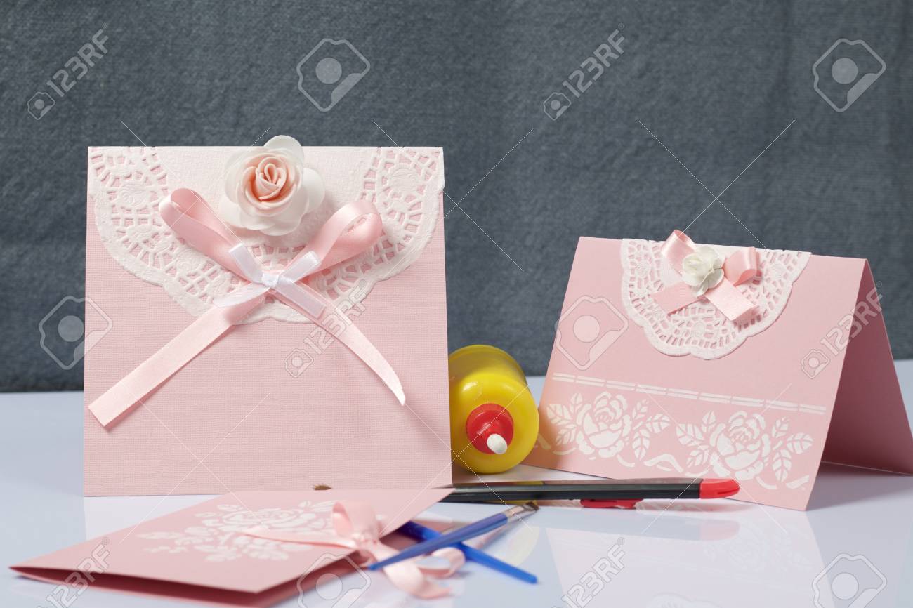 making greeting cards from paper cardboard and tape nearby making greeting cards