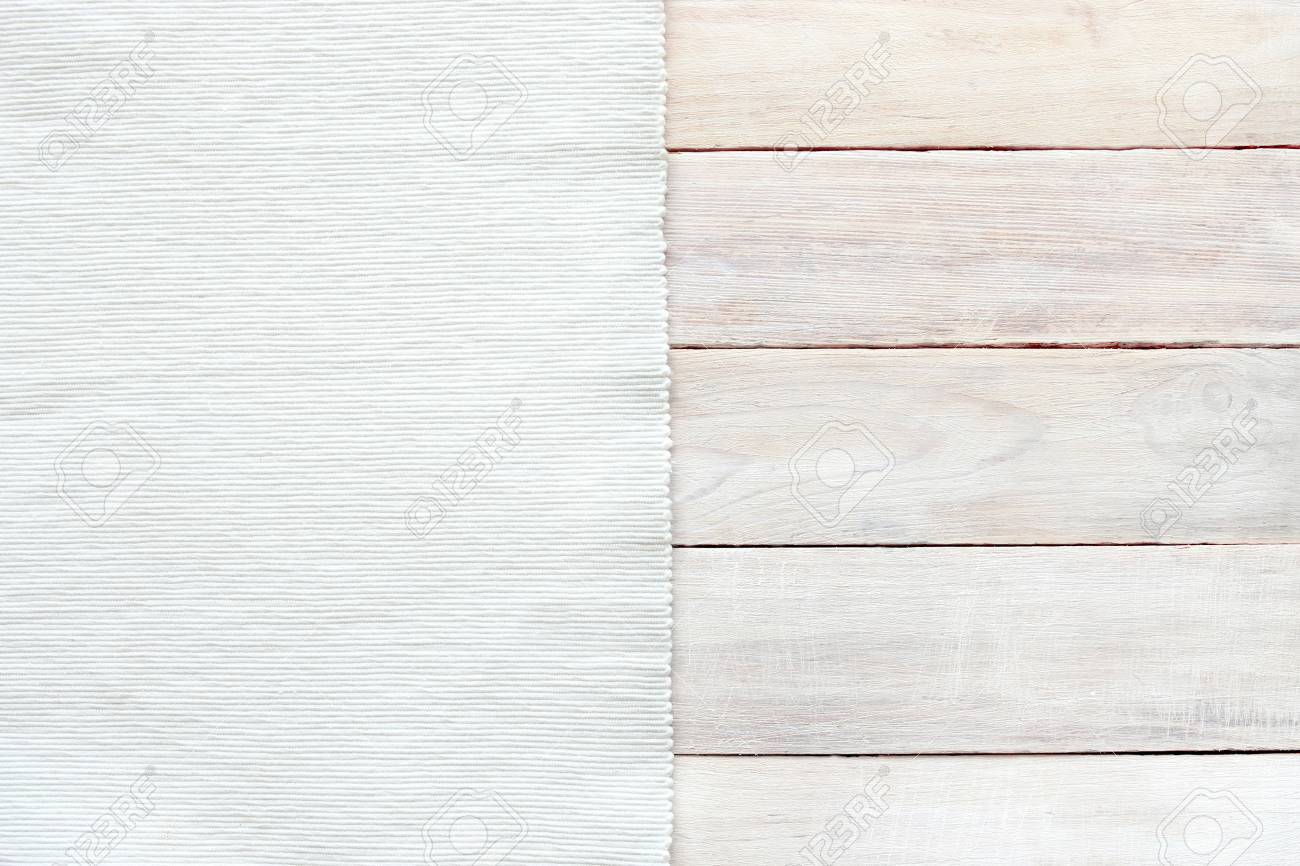 white velvet material and grunge wood board texture background