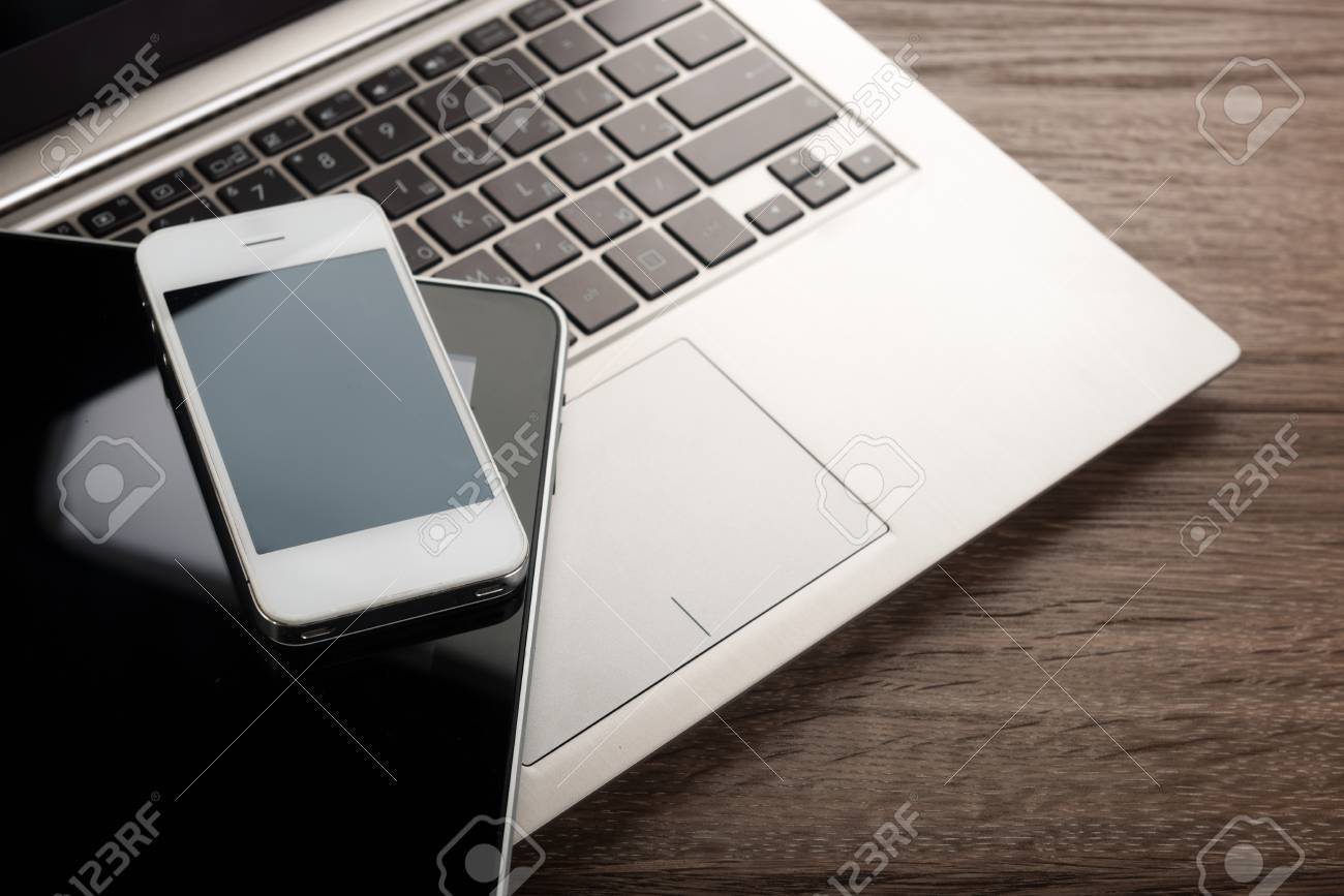 keyboard with phone and tablet pc on wooden desk - 33201849 keyboard with phone and tablet pc on wooden desk - 33201849