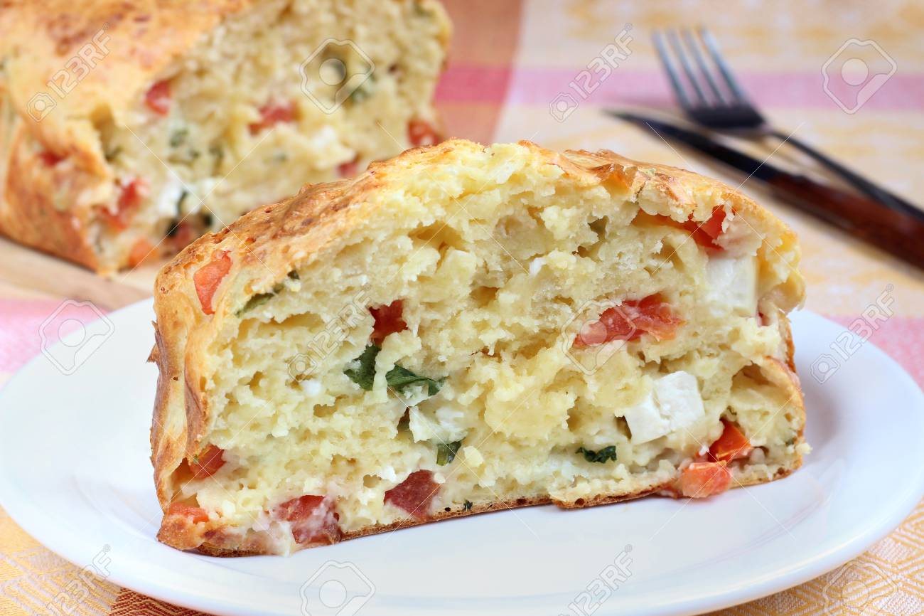 Savory Cake With Tomato Feta Cheese And Arugula Stock Photo Picture And Royalty Free Image Image