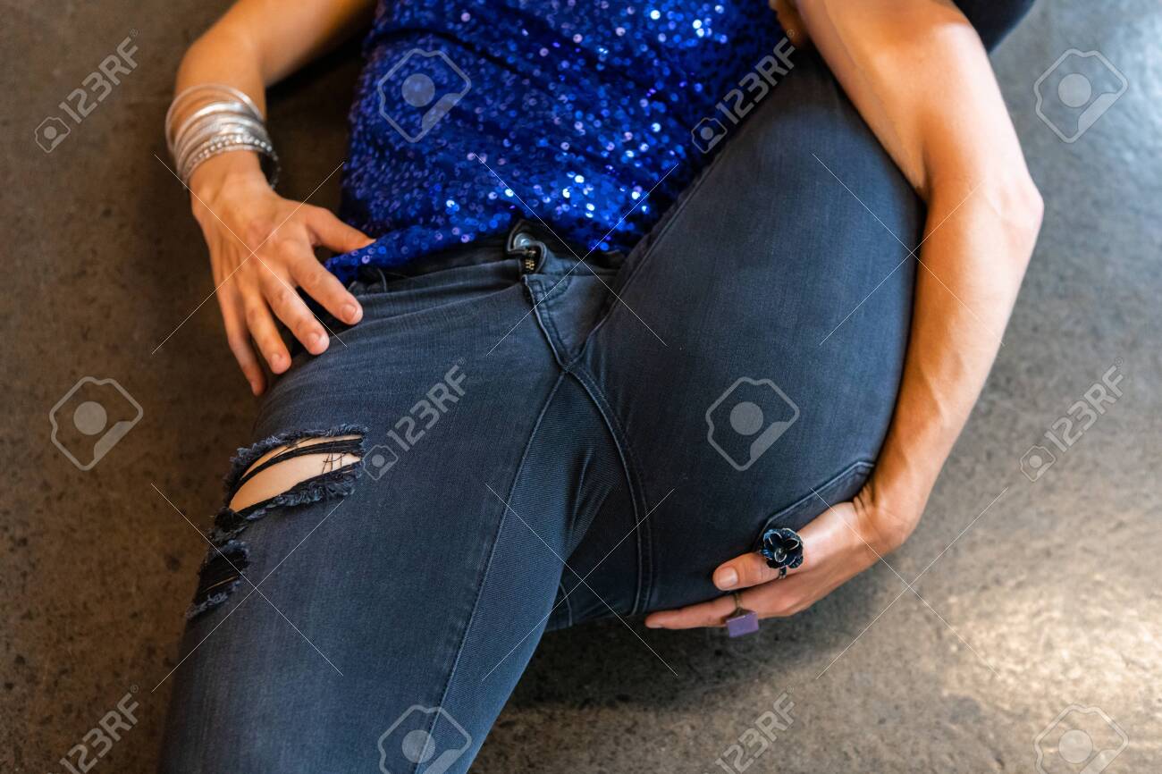 tight dark blue jeans